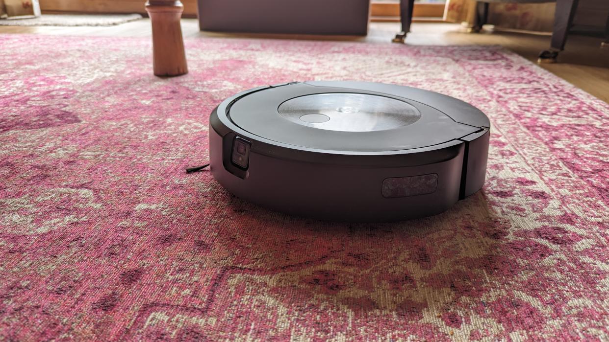  The Roomba Combo J9 Plus vacuuming a carpet. 