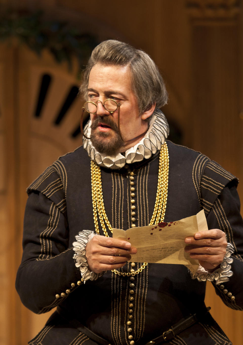 In this image provided Monday Nov. 19, 2012 by Sonia Friedman Productions, Stephen Fry, as the character Malvolio, during a dress rehearsal in "Twelfth Night" at a London theatre, Nov. 1, 2012. Mark Rylance's latest London performances are hot tickets, and not just because he is one of Britain's leading Shakespearean actors. It's a chance to see him in two wildly contrasting roles, the scheming usurper dispatching everyone who stands between him and the throne in "Richard III," and the aloof countess Olivia, blindsided by love, in the boisterous comedy "Twelfth Night." (AP Photo/Simon Annand, Sonia Friedman Productions)