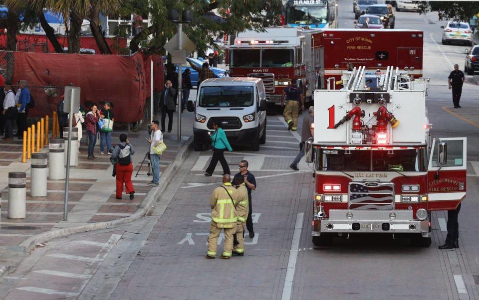 Pedestrians walk pass the closed Stephen P. Clark Center as City of Miami Police and Fire&Rescue responded and evacuated Stephen P. Clark Center after tremors were reported due to a 7.7 magnitude earthquake struck between Cuba and Jamaica shortly after 2:00 pm today.