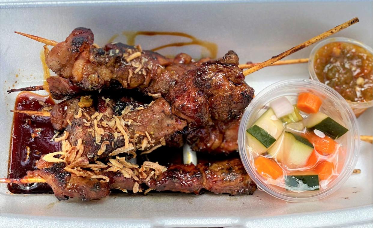 Saté babi (charcoal grilled fatty pork) from Saté Texas at the Thicket Food Park.