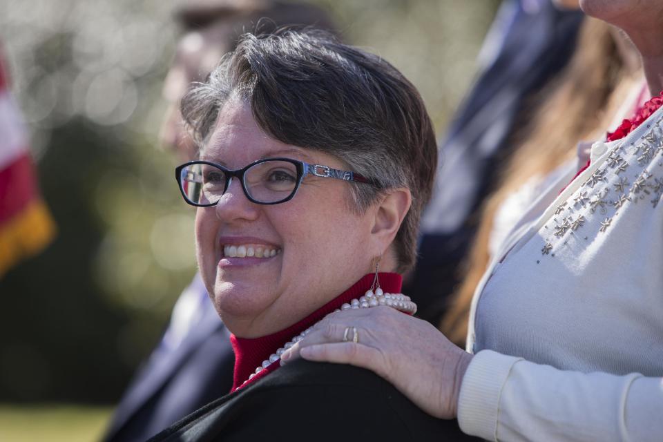 From left: Carol Schall and Mary Townley celebrate Thursday's ruling by federal Judge Arenda Wright Allen that Virginia's same-sex marriage ban was unconstitutional during a news conference, Friday, Feb. 14, 2014 in Norfolk, Va. Wright Allen on Thursday issued a stay of her order while it is appealed, meaning that gay couples in Virginia still won’t be able to marry until the case is ultimately resolved. An appeal will be filed to the 4th District Court of Appeals, which could uphold the ban or side with Wright Allen. (AP Photo/The Virginian-Pilot, Bill Tiernan) MAGS OUT