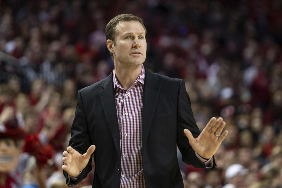 FILE - In this Feb. 15, 2020, file photo, Nebraska head coach Fred Hoiberg signs to the players during the first half of an NCAA colege basketball game against Wisconsin in Lincoln, Neb. Fred and Jack Hoiberg will be on opposite benches when Nebraska hosts Michigan State on Thursday night, Feb. 20, 2020. Fred is in his first year as the Cornhuskers' coach, and his son Jack is a reserve guard for the Spartans. (AP Photo/John Peterson, File)