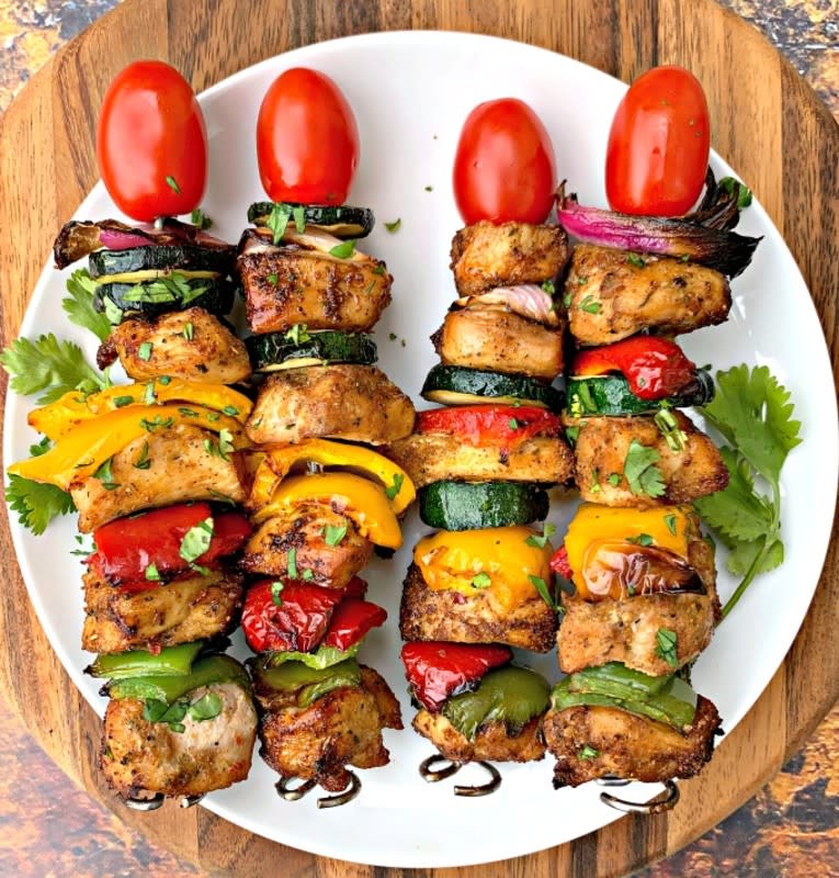 <p>Easy, air fryer grilled chicken kebabs is a quick recipe that uses chicken breasts and fresh veggies to create a healthy meal served on BBQ skewers.</p><p><strong>Get the recipe: <a href="https://www.staysnatched.com/air-fryer-chicken-kebabs/" rel="nofollow noopener" target="_blank" data-ylk="slk:Air Fryer Chicken Kebabs;elm:context_link;itc:0;sec:content-canvas" class="link rapid-noclick-resp">Air Fryer Chicken Kebabs</a></strong></p>