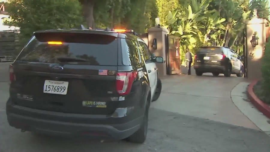 Police swarm a Beverly Crest mansion that squatters have turned into a party house after reports of a burglary on Jan. 26, 2024. (KTLA)