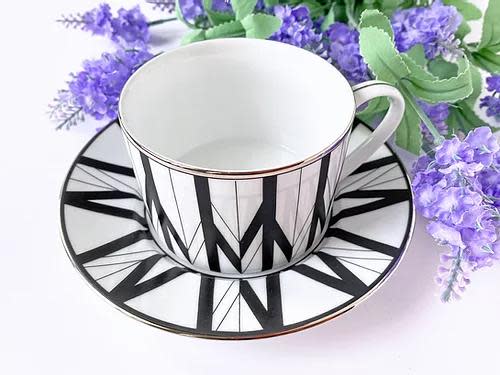 <p><a href="https://www.joymoyleratelier.com/product-page/beresford-cup" rel="nofollow noopener" target="_blank" data-ylk="slk:Shop Now;elm:context_link;itc:0;sec:content-canvas" class="link ">Shop Now</a></p><p>Beresford Cup</p><p>joymoyleratelier.com</p><p>$44.00</p><span class="copyright">Joy Moyler Atelier</span>