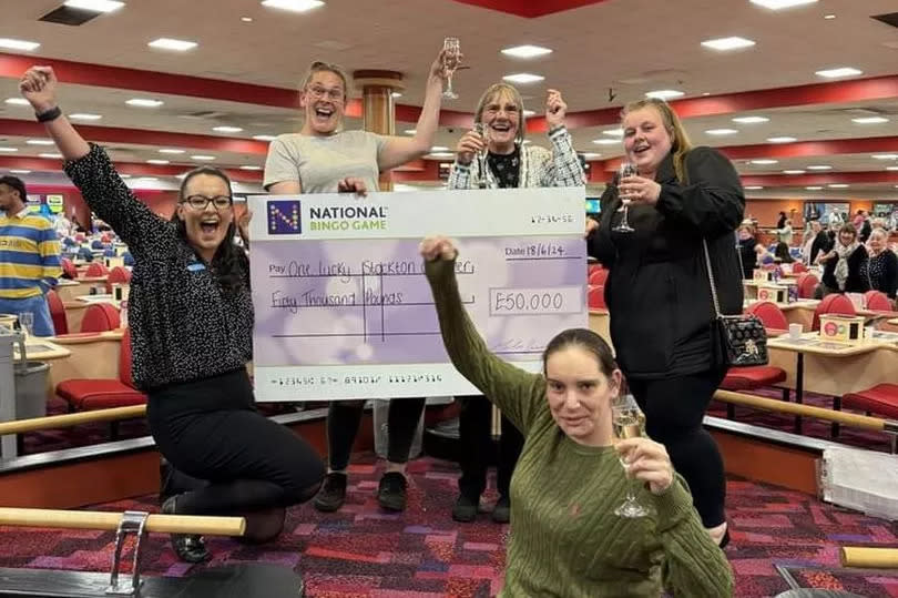 Joanne Bell (in grey t shirt) celebrates her £50K win at Mecca Bingo Stockton with her relatives and Mecca’s Jess Heron.