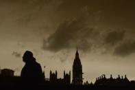 The sky over Westminster turns orange as storm Ophelia brings dust from the Sahara, filtering the light over London. REUTERS/Mary Turner