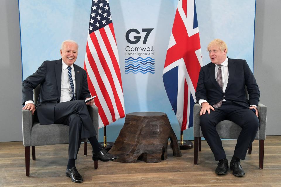 Britain's Prime Minister Boris Johnson (R) and US President Joe Biden pose before a bilateral meeting at Carbis Bay, Cornwall on June 10, 2021, ahead of the three-day G7 summit being held from 11-13 June. - G7 leaders from Canada, France, Germany, Italy, Japan, the UK and the United States meet this weekend for the first time in nearly two years, for the three-day talks in Carbis Bay, Cornwall. - (Photo by TOBY MELVILLE / POOL / AFP) (Photo by TOBY MELVILLE/POOL/AFP via Getty Images) (Photo: TOBY MELVILLE via Getty Images)