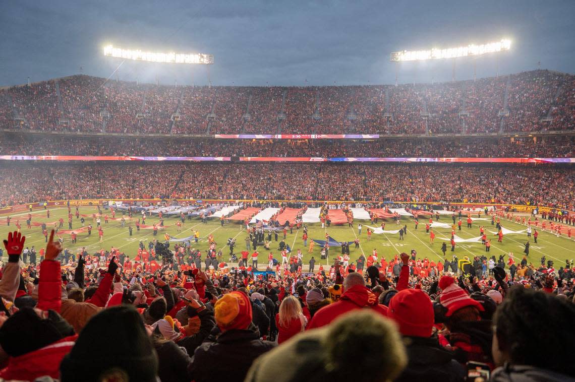 Kansas City Chiefs fans celebrate the national anthem before the AFC Championship Game against the Cincinnati Bengals at GEHA Field at Arrowhead Stadium on Sunday, Jan. 29, 2023, in Kansas City.