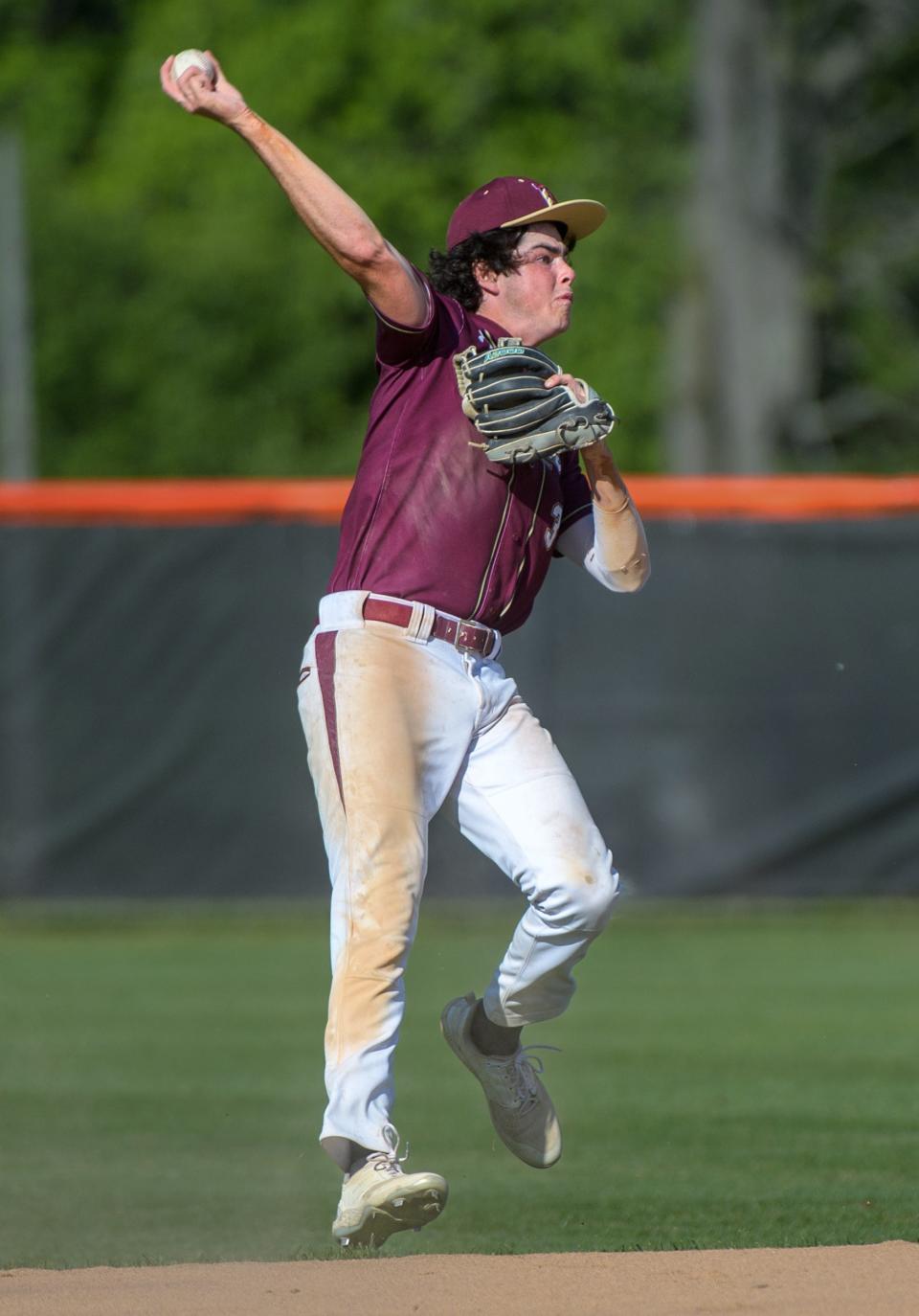 Dunlap's Davis Weeks makes an off-balance throw to first base for an out against Joliet Catholic during their Class 3A baseball sectional semifinal game Wednesday, May 29, 2024 in Washington. The Eagles fell 3-1.