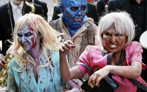 Participants march in the annual Halloween parade in Kawasaki near Tokyo in 2009 - Credit: Koji Sasahara / AP