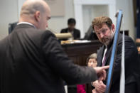 Prosecutor John Conrad reviews a timeline made by defense attorney Phillip Barber of events on Maggie Murdaugh's cell phone during Alex Murdaugh's trial for murder at the Colleton County Courthouse in Walterboro, S.C., on Wednesday, Feb. 1, 2023. (Joshua Boucher/The State via AP, Pool)