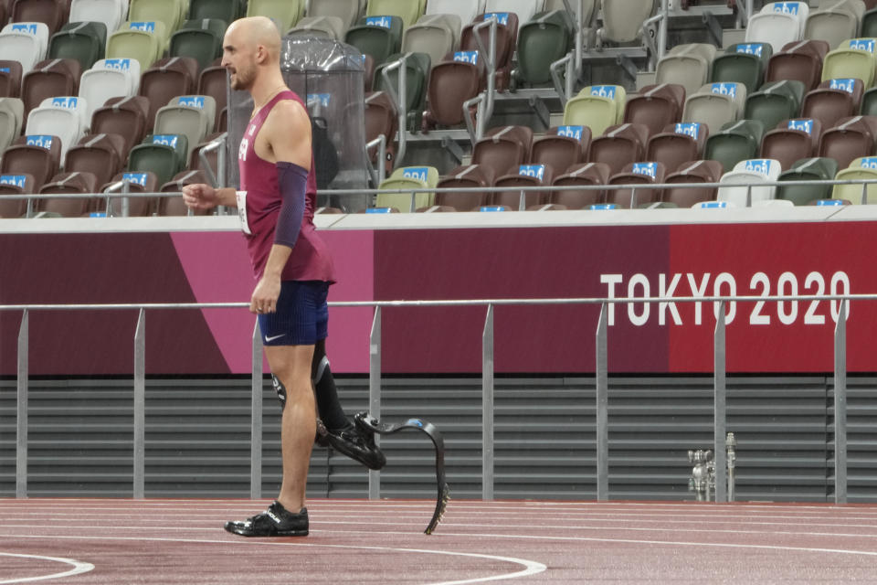 Sam Grewe of the United States prepares to compete in the men's high jump T63 final during the Tokyo 2020 Paralympics Games at the National Stadium in Tokyo, Japan, Tuesday, Aug. 31, 2021. (AP Photo/Eugene Hoshiko)