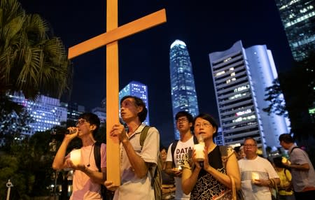 A Christian group marches towards Chief Executive Carrie Lam's house to support the anti-extradition bill protesters in Hong Kong