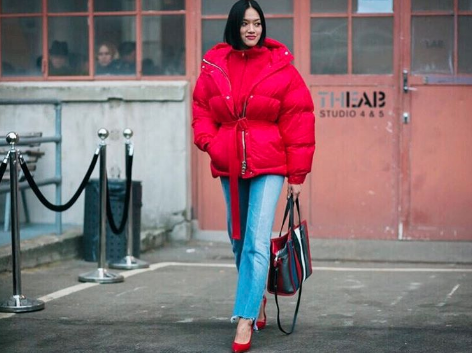 Who knew a massive red puffer jacket could look THIS fierce?