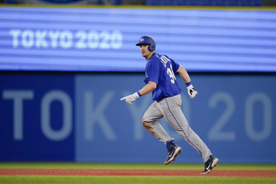 Israel's Ryan Lavarnway Rounds the basses after hitting a home run in the ninth inning a baseball game against South Korea at the 2020 Summer Olympics, Thursday, July 29, 2021, in Yokohama, Japan. (AP Photo/Sue Ogrocki)