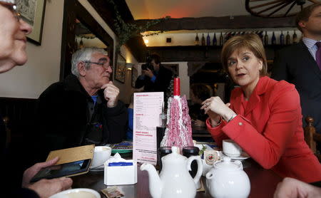 Scotland's First Minister Nicola Sturgeon campaigns in the La Lombarda restaurant Castlegate, Aberdeen, Scotland, April 8, 2015. REUTERS/Russell Cheyne