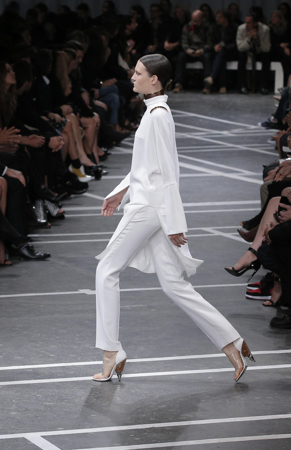 A model wears a creation by fashion designer Riccardo Tisci for Givenchy's ready to wear Spring-Summer 2013 collection, presented in Paris, Sunday, Sept. 30, 2012. (AP Photo/Francois Mori)