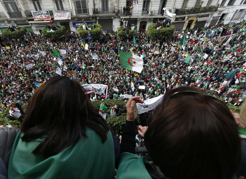 FILE - In tthis April 5, 2019 file photo, thousands of demonstrators gather for a rally in Algiers. Algerian authorities are leading a "clean hands" campaign aimed at rooting out corruption that has caught up top tycoons and former government ministers. Corruption is one of the major complaints of the masses of protesters who helped drive longtime leader Abdelaziz Bouteflika from office earlier this month. (AP Photo/Toufik Doudou, File)