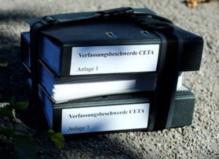 Constitutional complaint filing folders lie on the ground during a demonstration against the Comprehensive Economic and Trade Agreement (CETA) at the Constitutional Court in Karlsruhe, Germany August 31, 2016. REUTERS/Ralph Orlowski