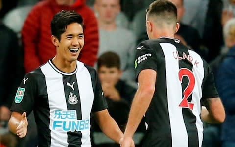 Yoshinori Muto and Ciaran Clark -  - Credit: Action Images&nbsp;