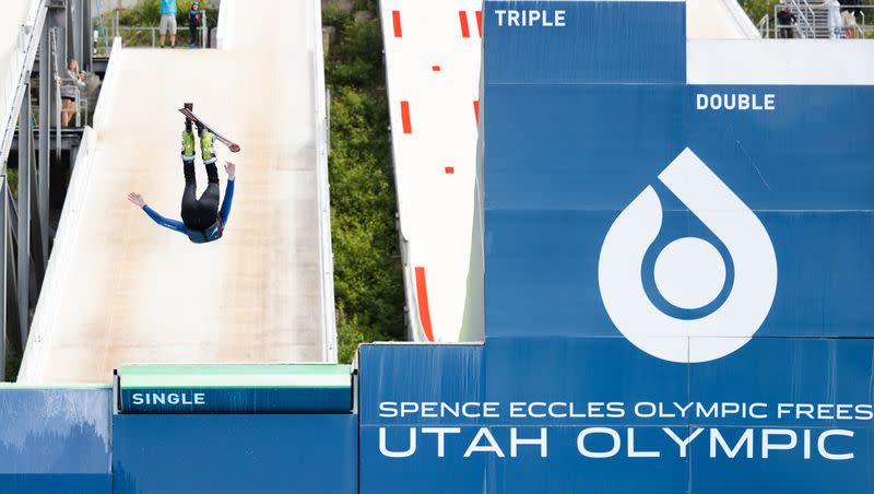 A participant jumps off a ski ramp at the Utah Olympic Park in Park City on Friday, June 23, 2023.
