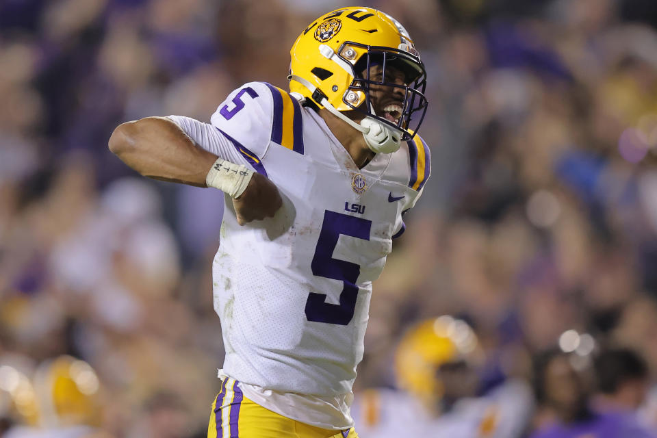 LSU quarterback Jayden Daniels celebrates after throwing a touchdown pass against the Alabama on November 05, 2022 in Baton Rouge, Louisiana. (Photo by Jonathan Bachman/Getty Images)