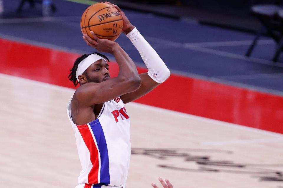 Detroit Pistons forward Jerami Grant (9) shoots in the first half against the Portland Trail Blazers at Little Caesars Arena on March 31, 2021.