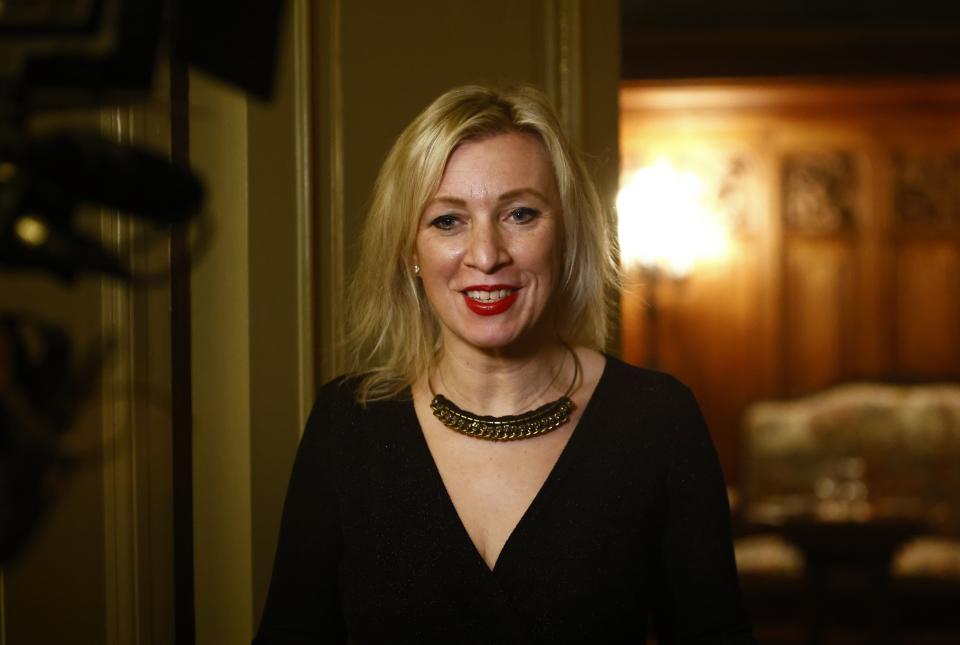 Russian Foreign Ministry spokeswoman Maria Zakharova smiles after Russian Foreign Minister Sergey Lavrov and German Foreign Minister Annalena Baerbock joint news conference following their talks in Moscow, Russia, Tuesday, Jan. 18, 2022. (Maxim Shemetov/Pool Photo via AP)