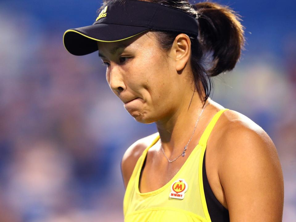 Shuai Peng of China looks on during her match against Agnieszka Radwanska of Poland on Day 7 of the Connecticut Open at Connecticut Tennis Center at Yale