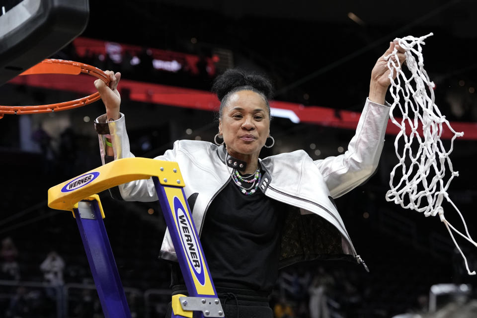 South Carolina coach Dawn Staley cuts down the net after winning the championship on Sunday. (AP Photo/Morry Gash)