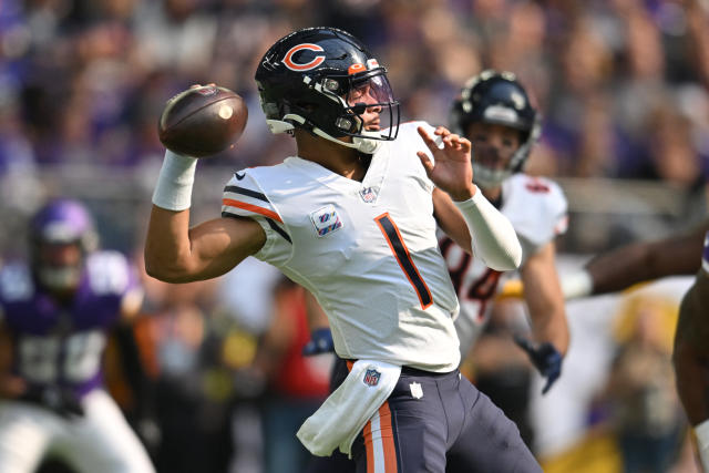 Chicago Bears quarterback Justin Fields looks to throw the