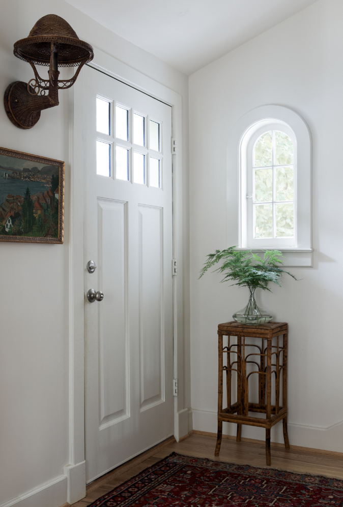 plant stand in entryway