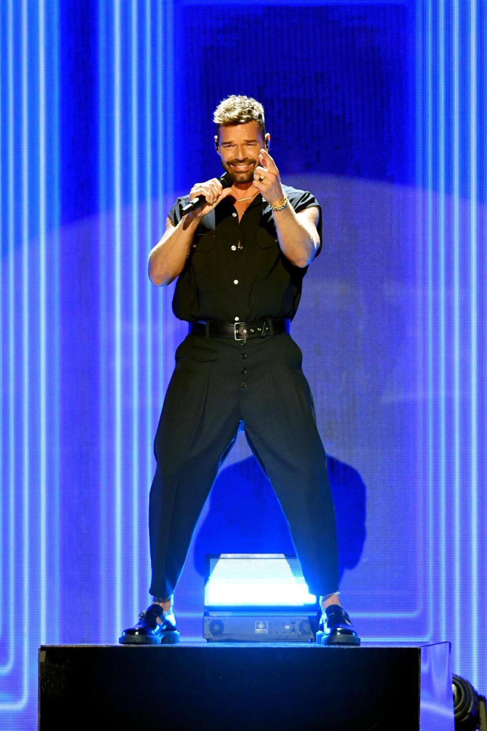 Ricky Martin, shown performing in Coral Gables, Fla., in July, is embarking on a joint tour with fellow Latin superstar Enrique Iglesias.