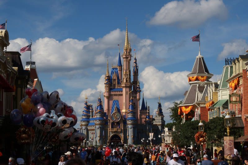 Cinderella Castle is decorated with gold ribbons, blue banners, a 50th-anniversary sign and EARidescent embellishment at Magic Kingdom Park during "The World's Most Magical Celebration" - the 50th anniversary of Walt Disney World Resort! on September 30, 2021 in Orlando, Florida. Fil photo by John Angelillo/UPI