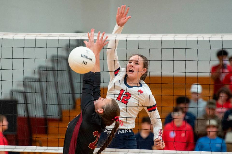 Hancock’s Anslee James blocks the ball during the 6A South State Championship game at Hancock High School in Kiln on Monday, Oct. 16, 2023.