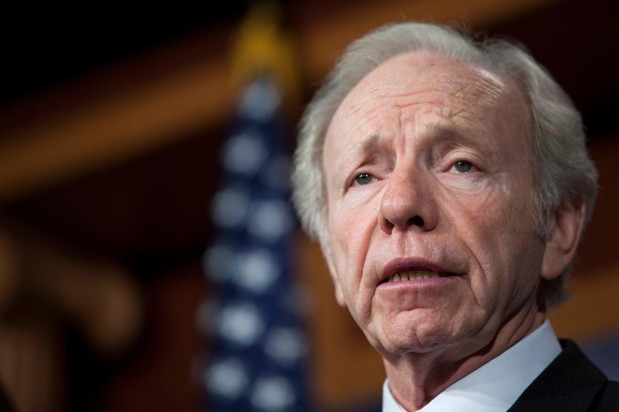 FILE - WASHINGTON, DC - U.S. Senator Joe Lieberman (I-CT) speaks during a press conference about their report on the Benghazi consulate attack, on Capitol Hill, on December 31, 2012 in Washington, DC. Lieberman died on March 27, 2024