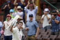 FILE - Australia's Steve Smith waves to the crowd as he walks from the field after he was run out 131 runs during play on day two of the third cricket test between India and Australia at the Sydney Cricket Ground, Sydney, Australia on Jan. 8, 2021. Smith was named as vice-captain of the Australian cricket team to new captain Pat Cummins Friday, Nov. 26, 2021. (AP Photo/Rick Rycroft, File)