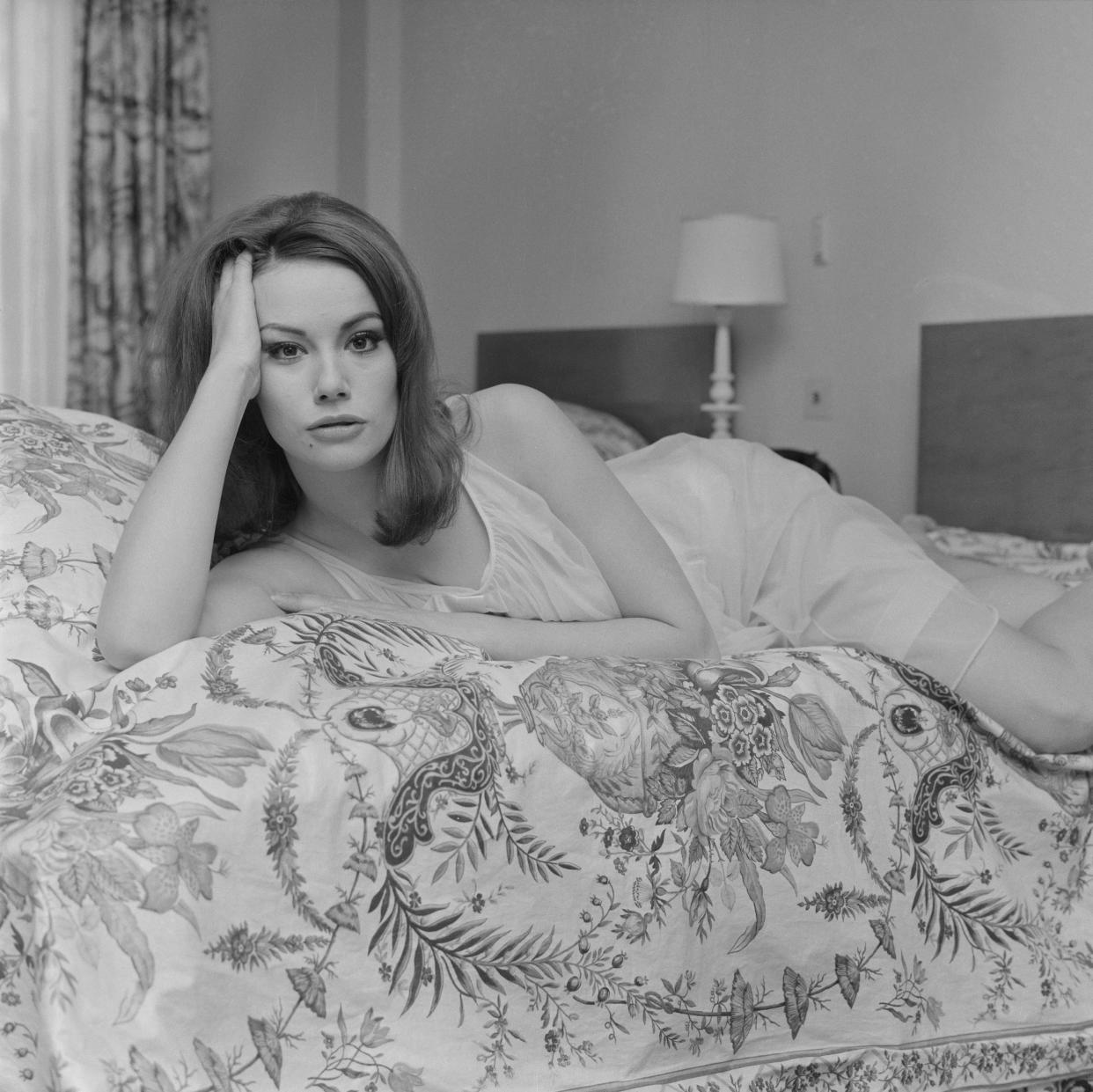 Claudine Auger poses for a photo shoot