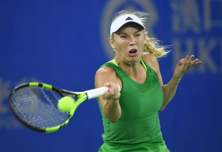 Caroline Wozniacki fresh from a title victory at the Pan Pacific Open in Tokyo on Sunday, took two sets to secure her place in the second round