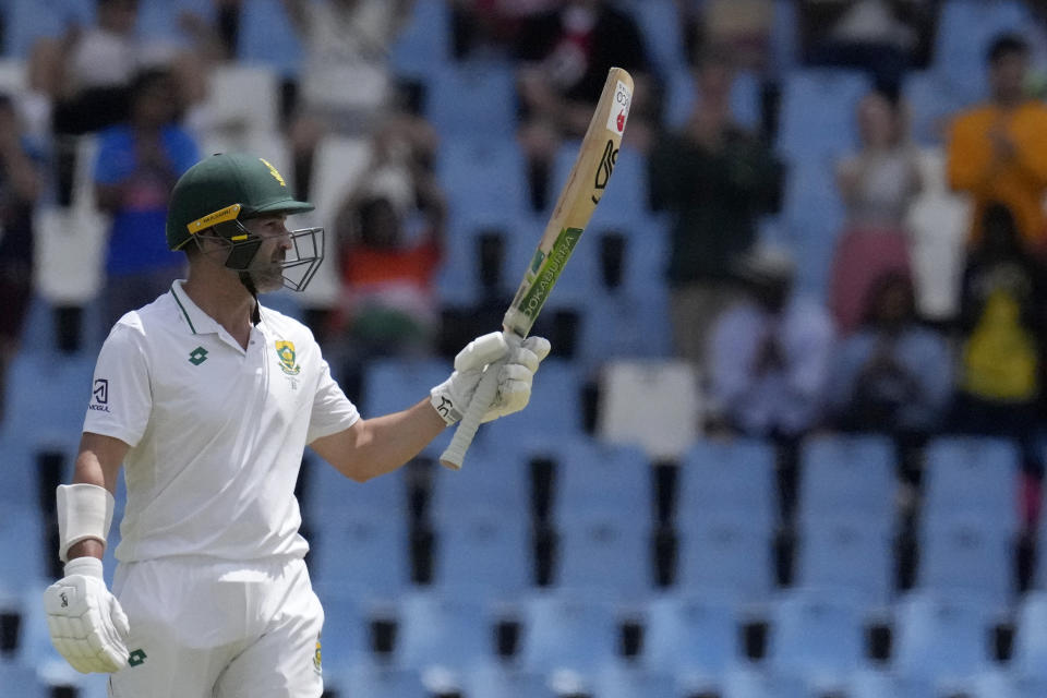 South Africa's batsman Dean Elgar raises his bat after scoring 150 runs during the third day of the Test cricket match between South Africa and India, at Centurion Park, in Centurion, on the outskirts of Pretoria, South Africa, Thursday, Dec. 28, 2023. (AP Photo/Themba Hadebe)