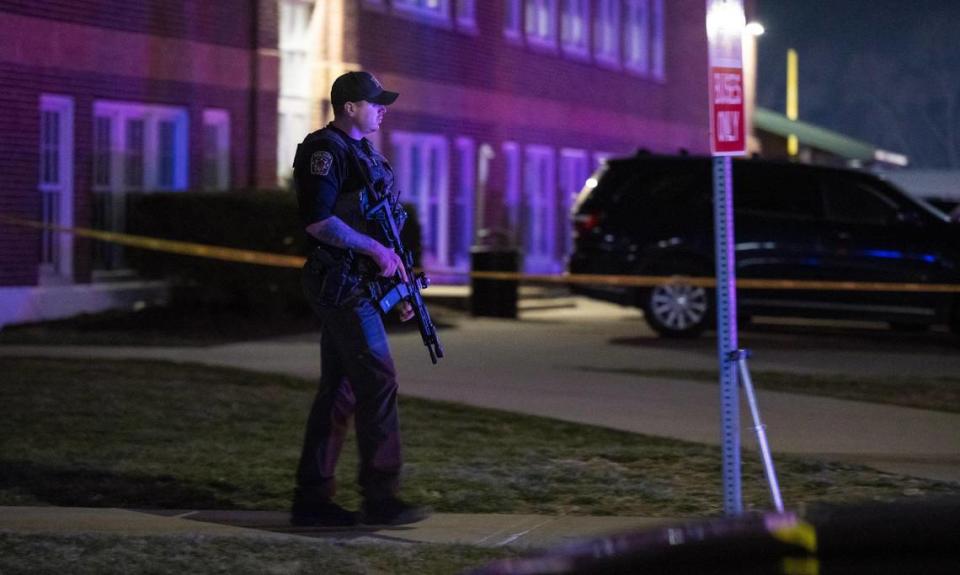 A Clay County sheriff’s deputy walks to his vehicle at the scene of a shooting outside of North Kansas City High School on Saturday, March 2, 2024, in Kansas City.