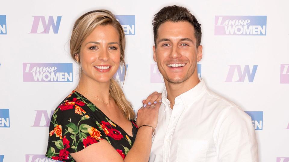 Gemma Atkinson in a floral dress with Gorka Marquez in a white shirt