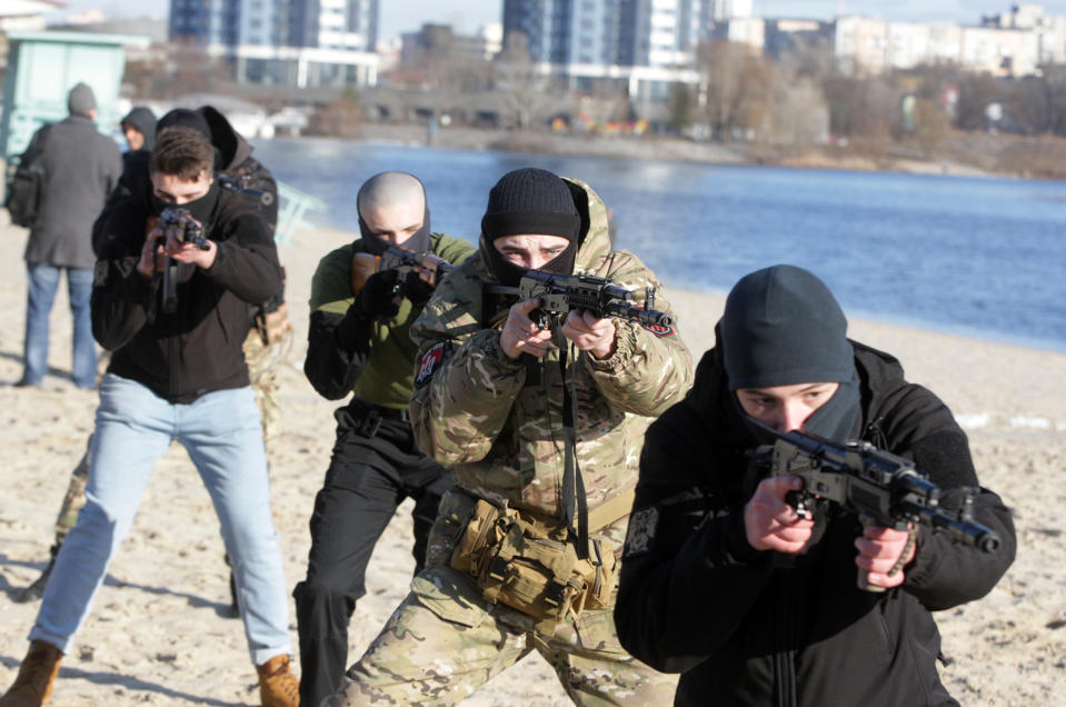 Civilians attend a military exercise for territorial defense amid the tension on the border with Russia, in Ukrainian capital Kyiv, Ukraine 13 February 2022. Members of 'Right Sector