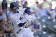 Milwaukee Brewers' Avisail Garcia hits a two-run home run during the sixth inning of a baseball game against the Pittsburgh Pirates Sunday, June 13, 2021, in Milwaukee. (AP Photo/Aaron Gash)