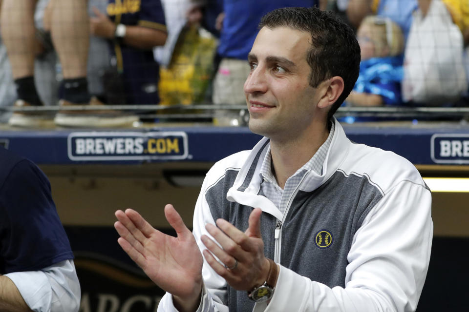 file - Milwaukee Brewers President of Baseball Operations David Stearns claps from the dugout after a baseball game against the New York Mets Sunday, Sept. 26, 2021, in Milwaukee. Stearns has agreed to become president of baseball operations for the underperforming New York Mets, according to several reports, Tuesday, Sept. 12, 2023. (AP Photo/Aaron Gash, File)