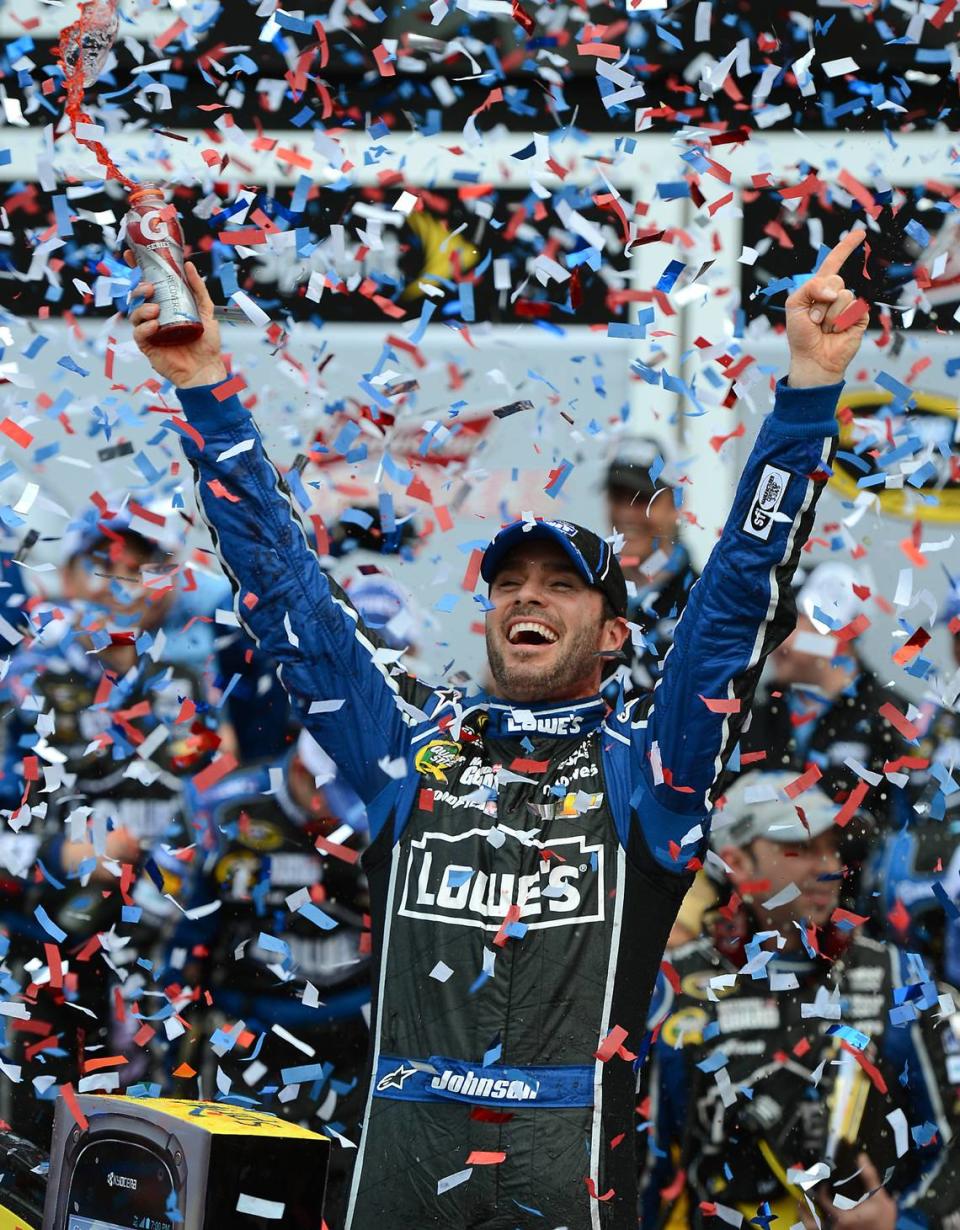 NASCAR Sprint Cup Series driver (48) Jimmie Johnson celebrates his victory in the Daytona 500 at Daytona International Speedway on Sunday, February 24, 2013. Jeff Siner - jsiner@charlotteobserver.com