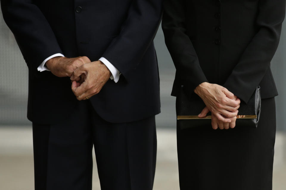 FILE - Spain's King Felipe and Queen Letizia clasp their hands outside Barcelona's Sagrada Familia Basilica for a solemn Mass in honour of the victims of the terror attacks that killed 14 people and wounded over 120 in Barcelona , Spain, Sunday, Aug. 20, 2017. Spain’s Queen Letizia turned 50 on Thursday, Sept. 15, 2022. Spain is taking the opportunity to assess its scarred monarchy and ponder how the arrival of a middle-class commoner may help shake one of Europe’s most storied royal dynasties into a modern and more palatable institution. (AP Photo/Manu Fernandez, File)