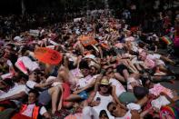 Participants take part in a "die in" during the LGBT Pride March in the Manhattan borough of New York City, U.S., June 25, 2017. REUTERS/Carlo Allegri