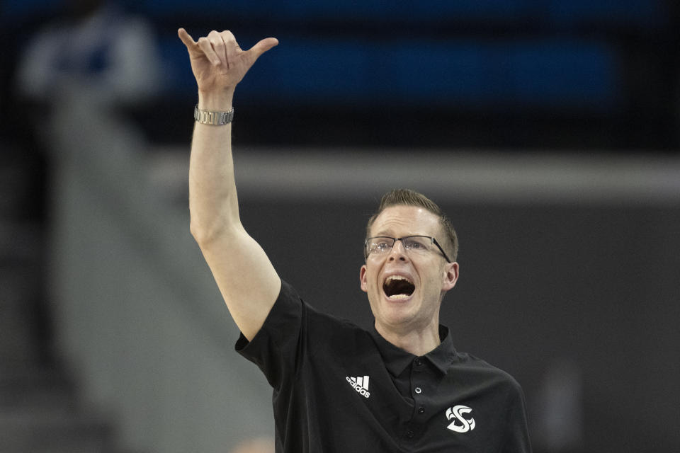 Sacramento State coach Mark Campbell instructs gestures to players during the first half of the team's first-round college basketball game against UCLA in the women's NCAA Tournament, Saturday, March 18, 2023, in Los Angeles. (AP Photo/Kyusung Gong)
